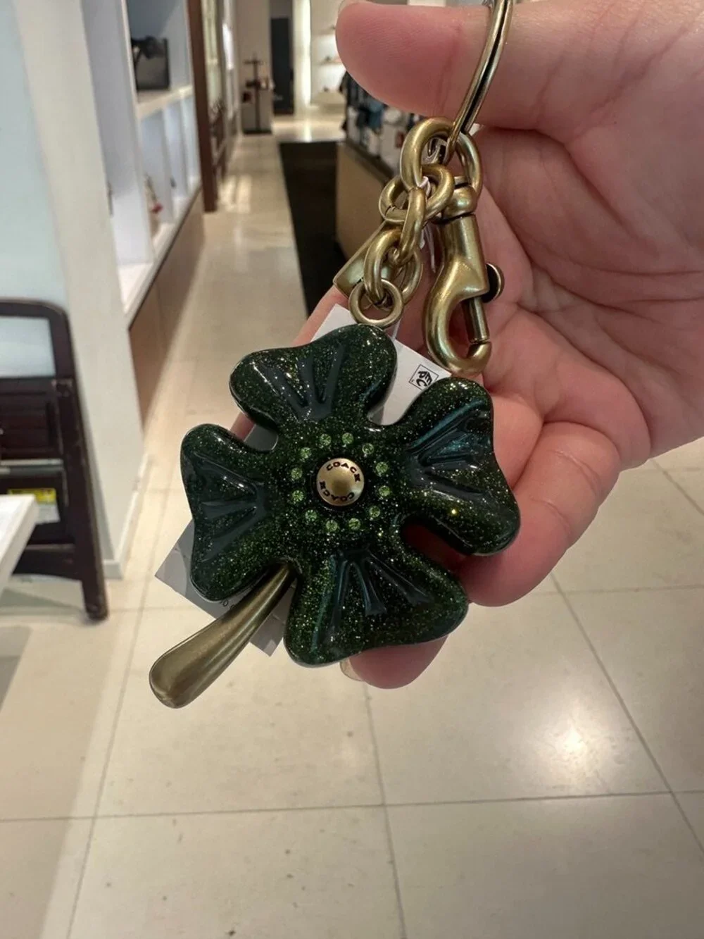 NWT! Coach CEA09 Four Leaf Clover Bag Charm In Brass/Green Multi With Dust Bag